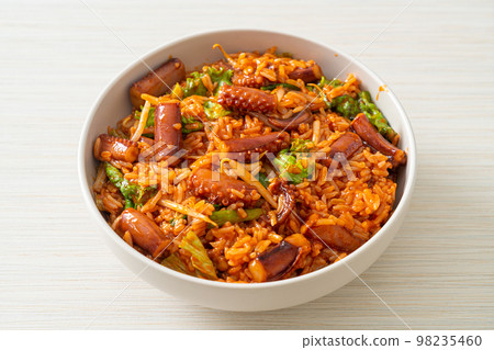 Stir-fried squid or octopus with Korean spicy sauce rice bowl Stir-fried squid or octopus with Korean spicy sauce rice bowl 98235460