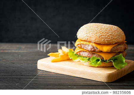 pork burger with cheese and french fries pork burger with cheese and french fries 98235606