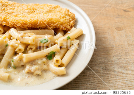 quadrotto penne pasta white cream sauce with fried fish 98235685