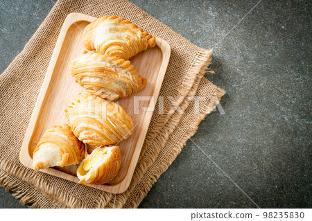 curry puff stuffed beans on plate 98235830