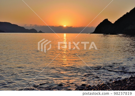 Amami Oshima Beautiful sunrise over Isu Bay, Setouchi Town Amami Oshima Beautiful sunrise over Isu Bay, Setouchi Town 98237819