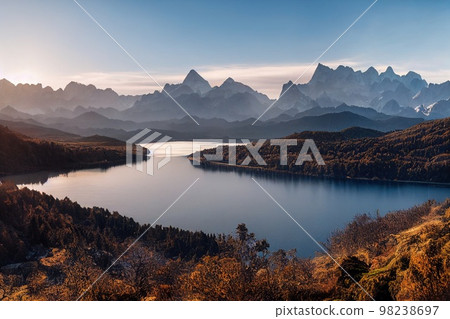Beautiful ancient mountains at sunset, in the evening sunlight and in the fog. 3D rendering. 98238697