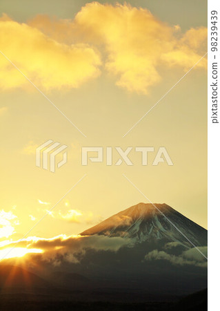 Mt. Fuji and the first sunrise Mt. Fuji and the first sunrise 98239439