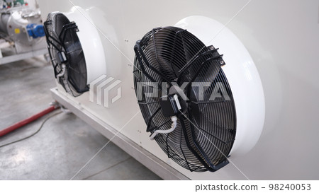Cooling industrial air conditioners and fans closeup. 98240053
