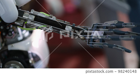 Future technology in black prosthetic hand closeup 98240148