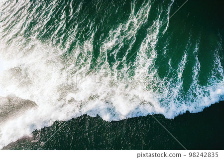 Spectacular aerial top view background photo of ocean sea water splashing. Spectacular aerial top view background photo of ocean sea water splashing. 98242835