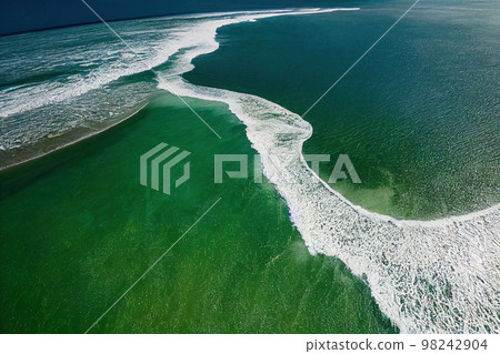 Spectacular aerial top view background photo of ocean sea water splashing. 98242904
