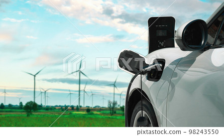Progressive electric vehicle powered by clean energy generated by wind turbine. 98243550