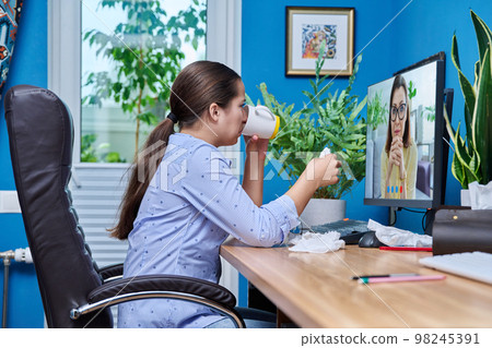 Teenage upset crying girl on online therapy with a psychologist Teenage upset crying girl on online therapy with a psychologist 98245391