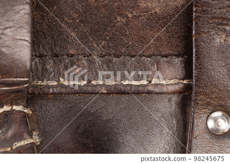 Leather product with rivets and seam. 98245675