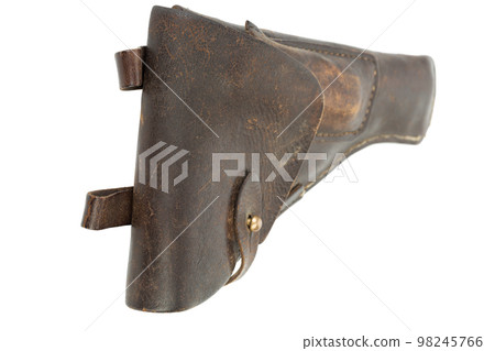 An old brown leather pistol holster. An old brown leather pistol holster. 98245766