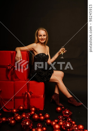 Young beautiful seductive woman with large - Stock Photo