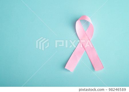 pink ribbon breast cancer on blue background pink ribbon breast cancer on blue background 98246589