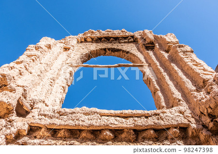 Kasbah of the Oasis - An old kasbah in the middle of a lush oasis 98247398