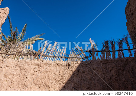 Kasbah of the Oasis - An old kasbah in the middle of a lush oasis Kasbah of the Oasis - An old kasbah in the middle of a lush oasis 98247410