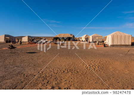A traditional Moroccan nomad camp set up in the desert A traditional Moroccan nomad camp set up in the desert 98247478