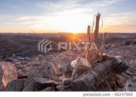 Traditional Moroccan mint tea prepared on the fire on top of a mountain Traditional Moroccan mint tea prepared on the fire on top of a mountain 98247868