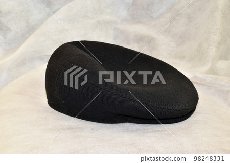 Men's cap sewn from fabric on white. Men's cap sewn from fabric on white. 98248331