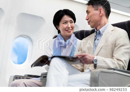 Middle-aged couple on board 98249233