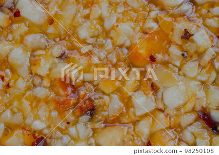 Close up: granola sesame hazelnuts bar, caramelized nuts - Gozinaki: top view 98250108