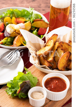 Party dish full of vegetables 1 with beer 98250566