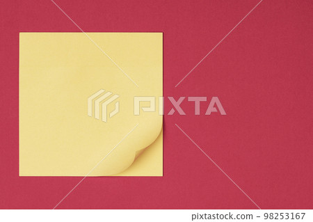 Yellow sticky note on red background waiting for your message Yellow sticky note on red background waiting for your message 98253167