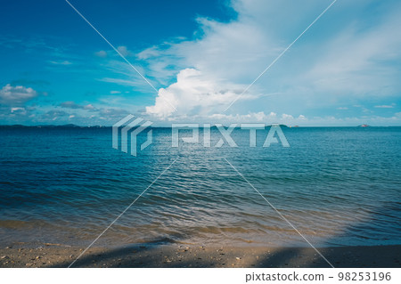 Sea beach wave white sand against blue sky cloud serenity scene Sea beach wave white sand against blue sky cloud serenity scene 98253196
