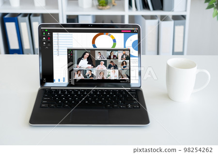 Web conference. Business meeting. Corporate webcast. Professional team discussing statistics working online on laptop screen at office workplace. 98254262