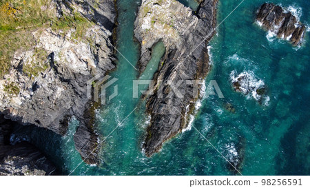Turquoise waters of the Atlantic Ocean and large coastal cliffs. Beautiful seascape, top view. Drone point of view. 98256591