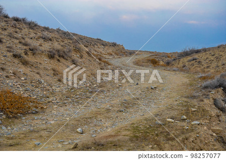 Winding road in the countryside 98257077