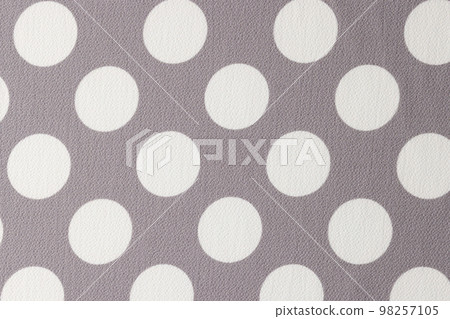 Gray and white fabric with polka dot pattern. Gray and white fabric with polka dot pattern. 98257105