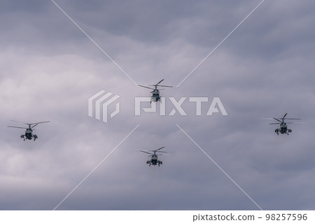 Russia. Kronstadt. July 31, 2022. A flight of Ka-31R and Ka-29 helicopters at the naval parade. 98257596