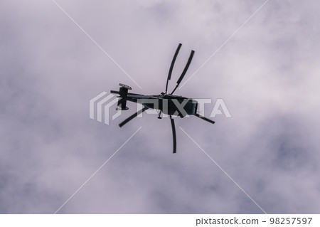 Russia. Kronstadt. July 31, 2022. A flight of Ka-31R and Ka-29 helicopters at the naval parade. Russia. Kronstadt. July 31, 2022. A flight of Ka-31R and Ka-29 helicopters at the naval parade. 98257597