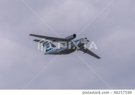 Russia. Kronstadt. July 31, 2022. A flight of AN-72 aircraft at the naval parade. Russia. Kronstadt. July 31, 2022. A flight of AN-72 aircraft at the naval parade. 98257599