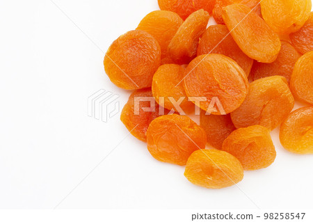 Dried apricots on white background. 98258547