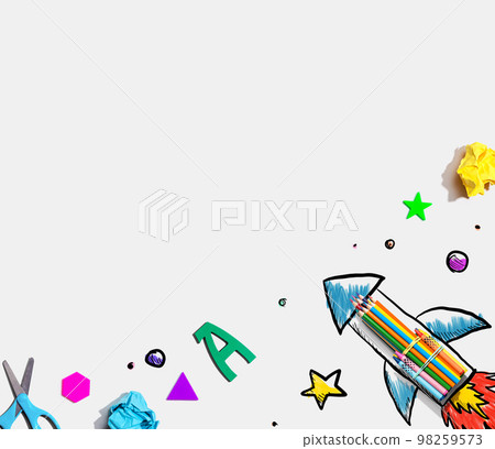 Back to school theme with a rocket with school supplies Back to school theme with a rocket with school supplies 98259573
