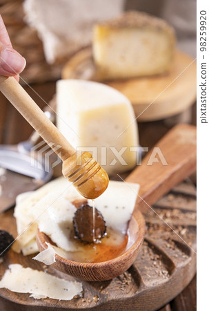 Pecorino cheese with truffle, traditional Italian sheep's milk cheese with truffle. A typical 98259920