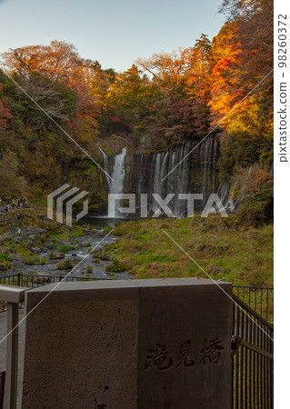 Shiraito Falls and the beautiful autumn sky Shiraito Falls and the beautiful autumn sky 98260372