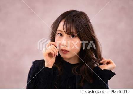 woman with a feminine flair woman with a feminine flair 98261311