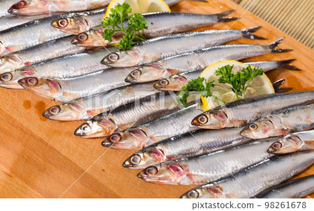 Lot of fresh raw anchovies 98261678