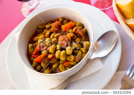 Habas a la Catalana, stew of beans with blood sausage Habas a la Catalana, stew of beans with blood sausage 98262099