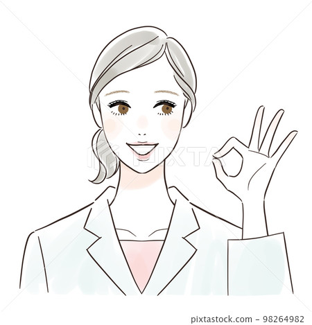 一個穿白大衣的女人微笑著做出好的手勢 98264982