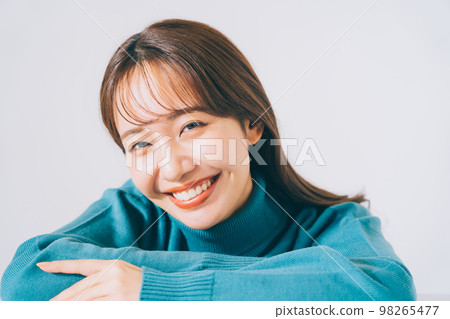 woman in blue knit woman in blue knit 98265477