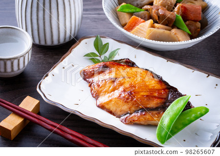 Yellowtail teriyaki and sake 98265607