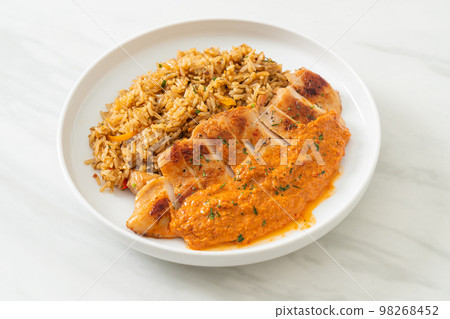 grilled chicken steak with red curry sauce and rice grilled chicken steak with red curry sauce and rice 98268452
