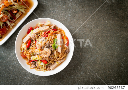 Instant noodles spicy salad on plate 98268587
