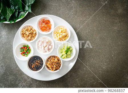 Miang kham - A royal leaf wrap appetizer 98268837