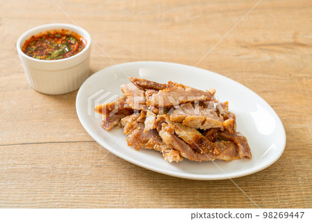 Grilled Pork Neck with Thai Spicy Sauce Grilled Pork Neck with Thai Spicy Sauce 98269447