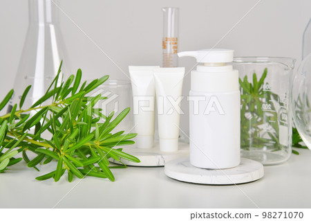 Natural skincare beauty product, Cosmetic white bottle containers packaging with green nature Natural skincare beauty product, Cosmetic white bottle containers packaging with green nature 98271070
