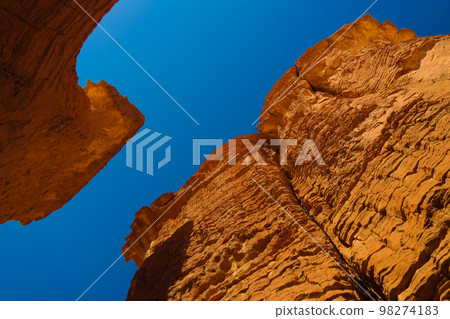 Bottom-up view to Abstract Rock formation at plateau Ennedi aka stone forest in Chad 98274183
